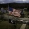 Old Glory and a POW/MIA flag wave in front of the Shade Community Center that faces the old Route 33.