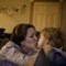 Elizabeth Schwarzel gets a kiss from her son Brody at their home beneath the Copper Top Inn in Shade, Ohio.